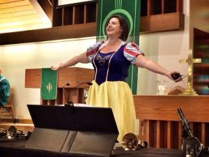 I take no blame for the halo in this picture. And the handbell tables are obscuring the red cowboy boots.