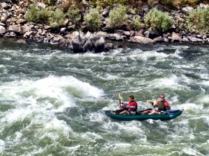Justin poses for camera while Elliott dutifully steers the course
