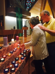lighting candles to remember